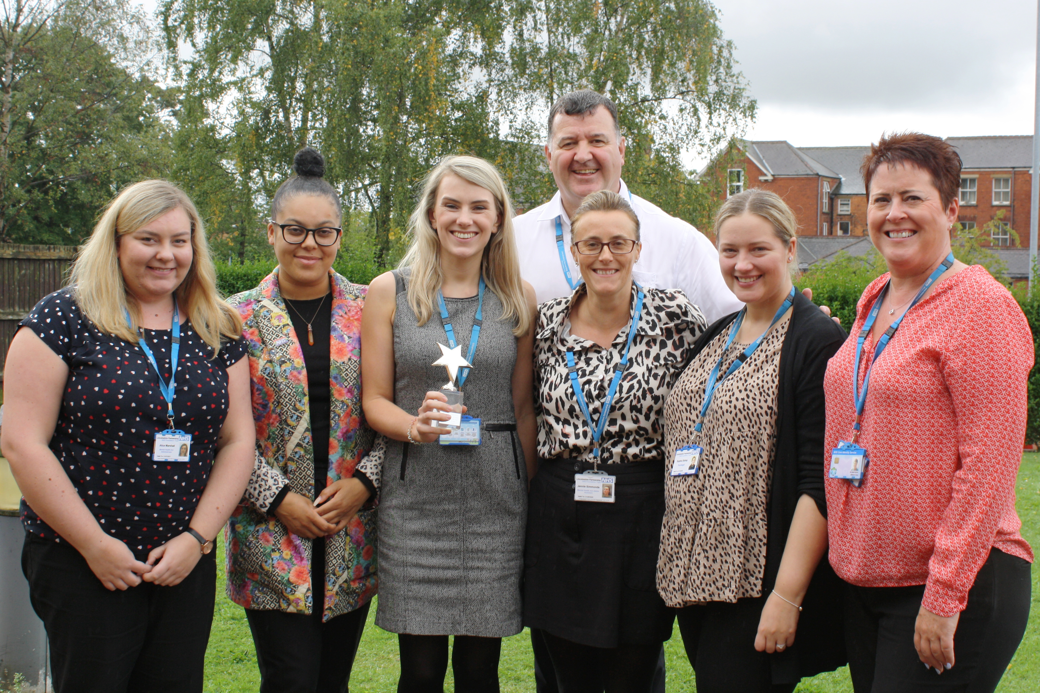 Legal services and mental health act administration team with their LPFT Heroes award