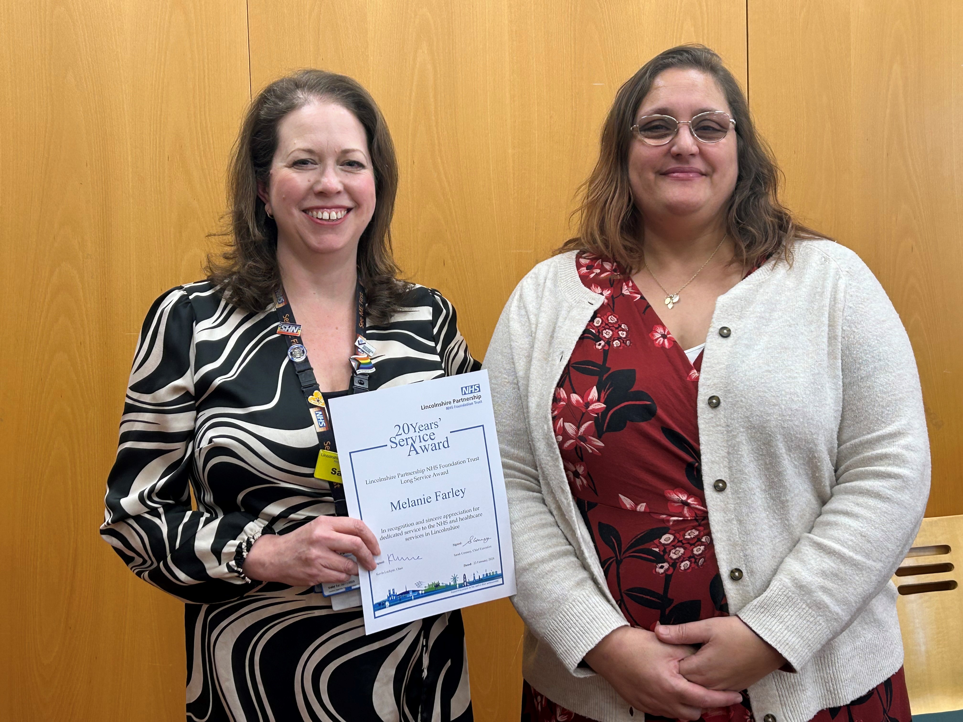 Left, Sarah Connery; right, Melanie Farley with her Long Service Award